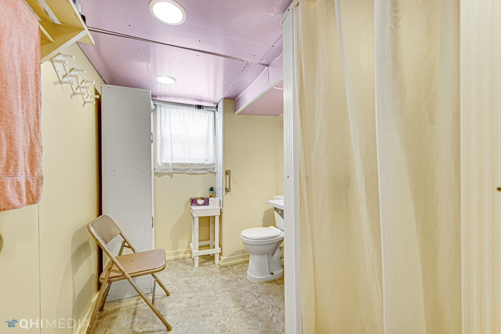 520 North Reed Street Joliet, IL 60435 - Photo 16 of 23 a bathroom with a sink and a toilet