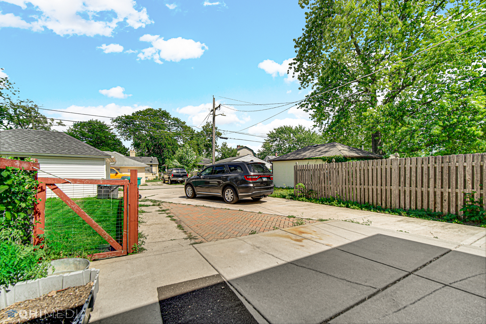 520 North Reed Street Joliet, IL 60435 - Photo 20 of 23 a view of a patio with a table and chairs