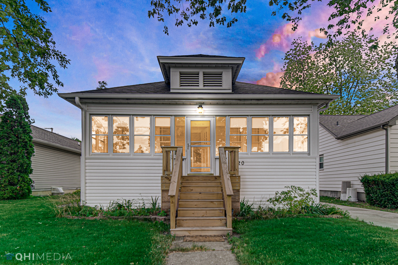 520 North Reed Street Joliet, IL 60435 - Photo 2 of 23 a front view of a house with garden
