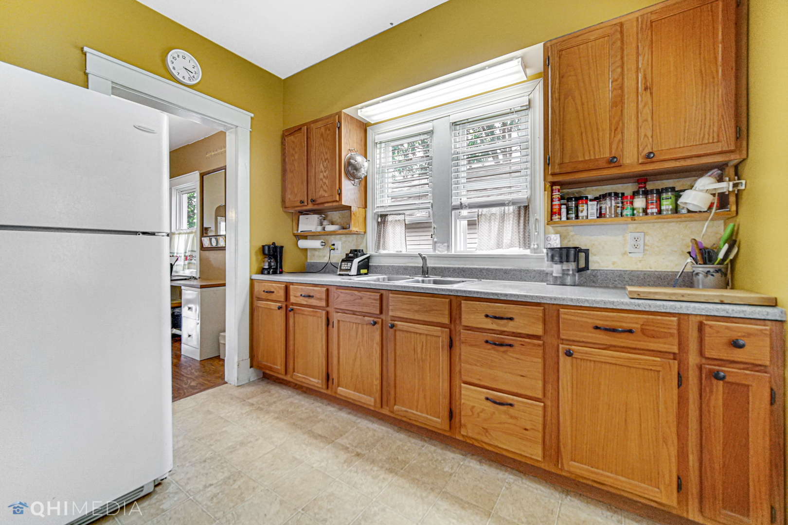 520 North Reed Street Joliet, IL 60435 - Photo 6 of 23 a kitchen with stainless steel appliances granite countertop a refrigerator and a sink