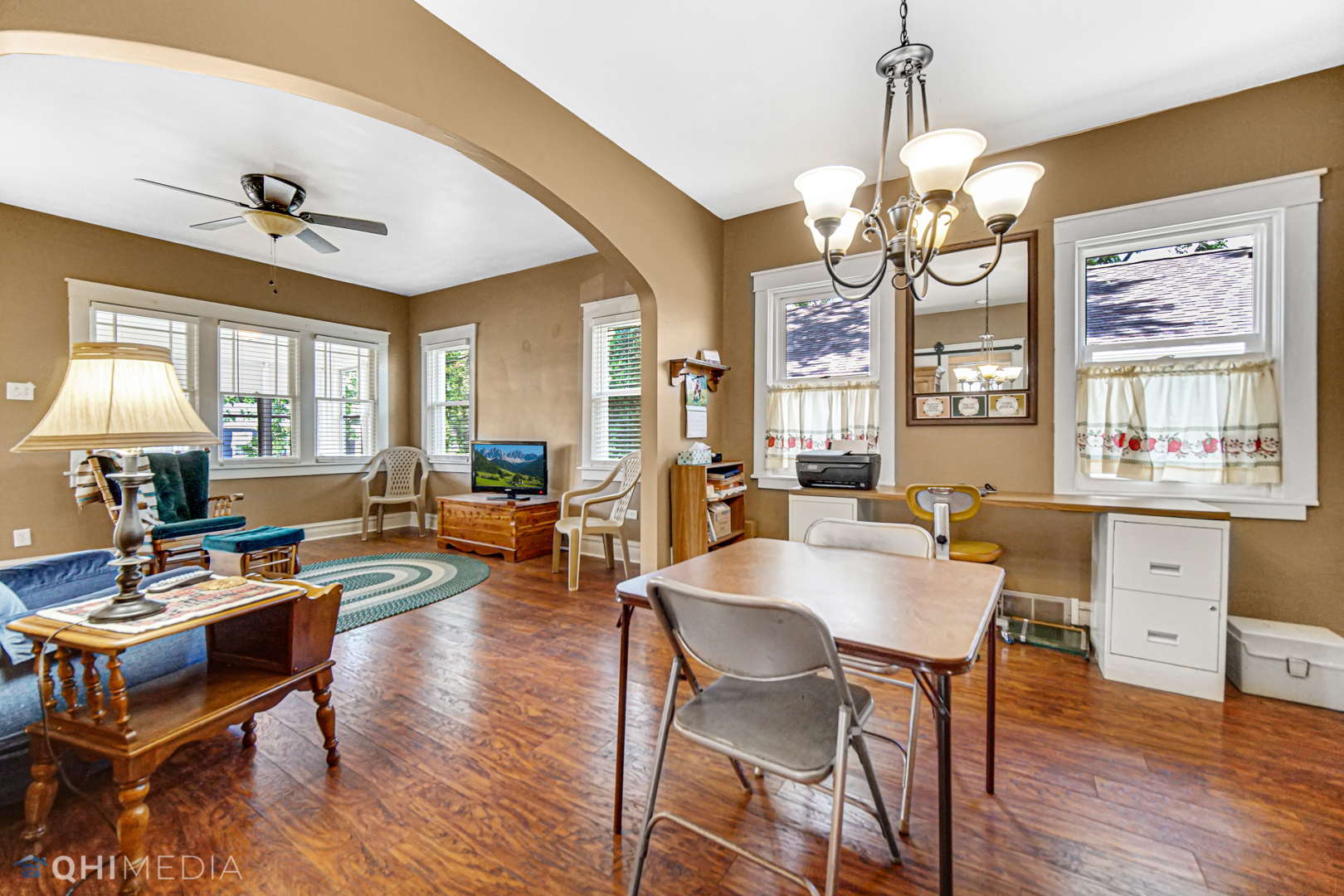 520 North Reed Street Joliet, IL 60435 - Photo 8 of 23 a view of a dining room with furniture a chandelier and wooden floor