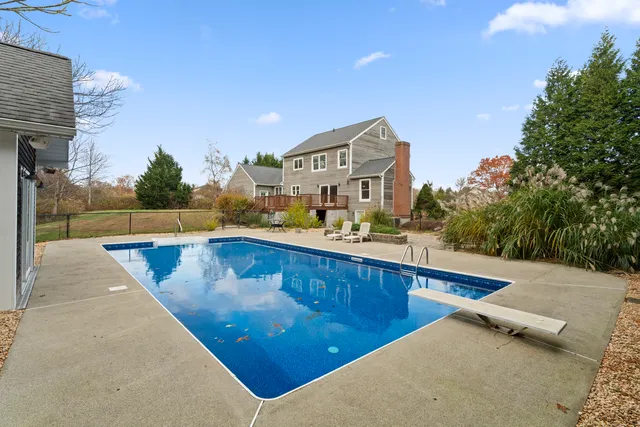 a kitchen with a sink dishwasher and a stove top oven