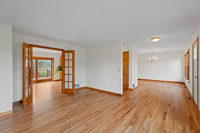 a view of a livingroom with wooden floor