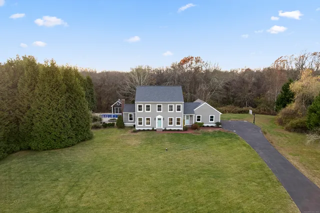 an aerial view of lake residential house with outdoor space
