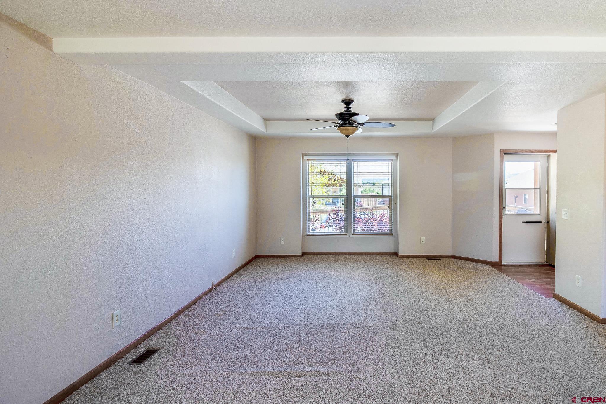 801 L Way Cortez, CO 81321 - Photo 11 of 41 an empty room with windows and closet