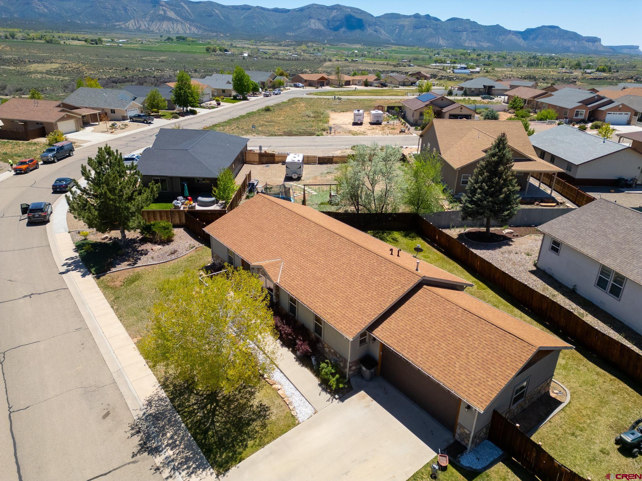 801 L Way Cortez, CO 81321 - Photo 30 of 41 an aerial view of residential houses with outdoor space