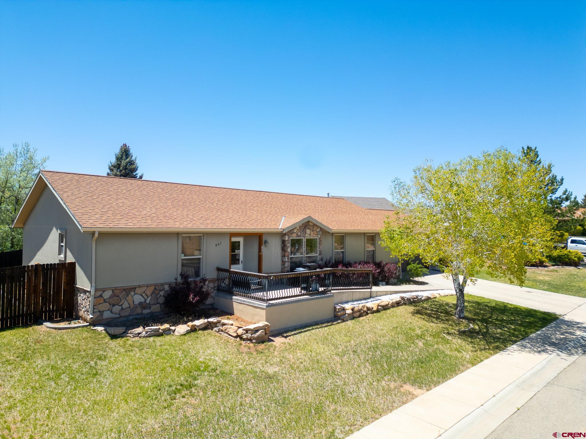 801 L Way Cortez, CO 81321 - Photo 31 of 41 a view of a house with swimming pool and sitting area