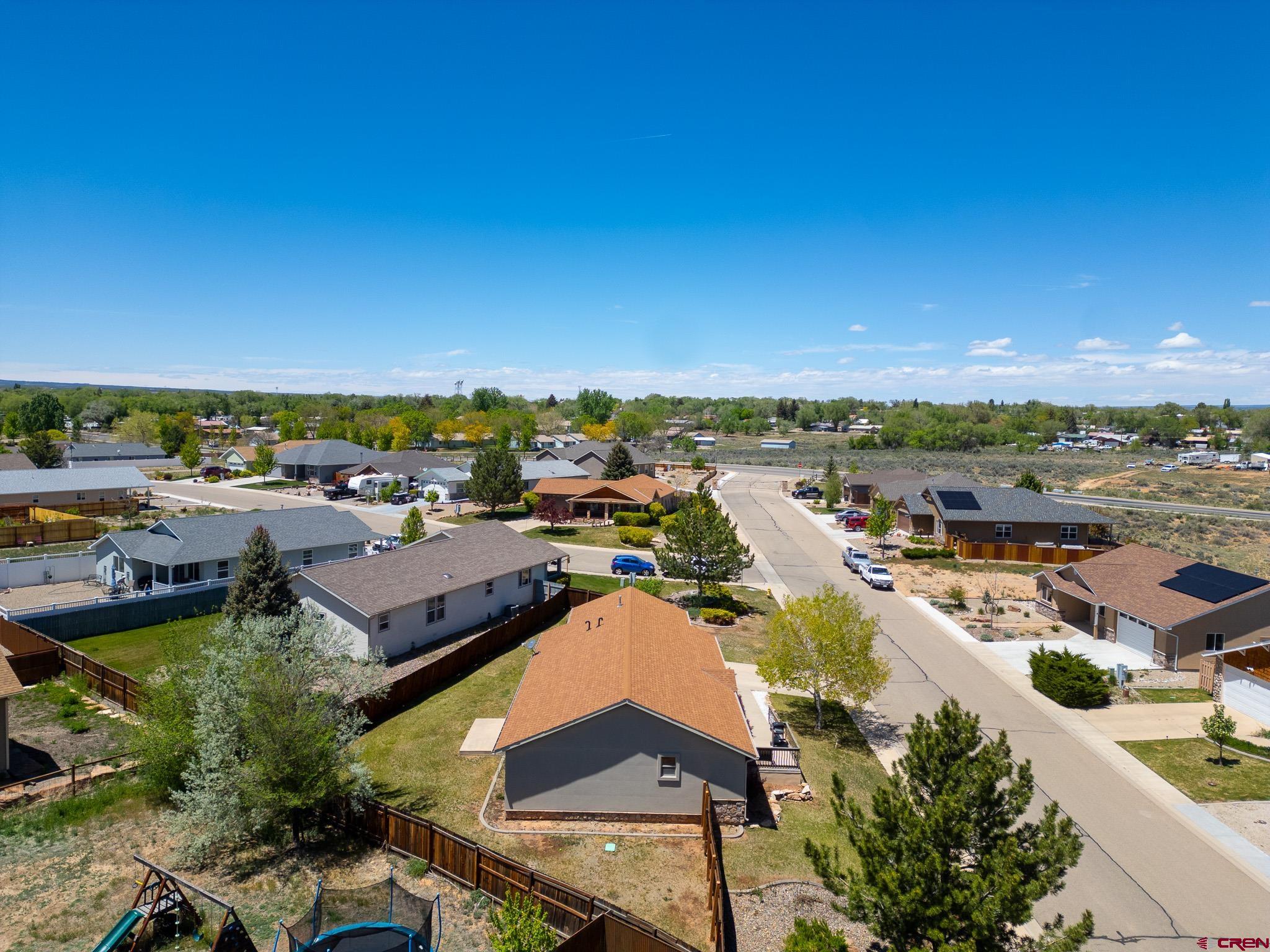 801 L Way Cortez, CO 81321 - Photo 37 of 41 an aerial view of residential houses with outdoor space
