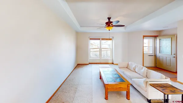 a large kitchen with stainless steel appliances granite countertop a stove a sink and a refrigerator