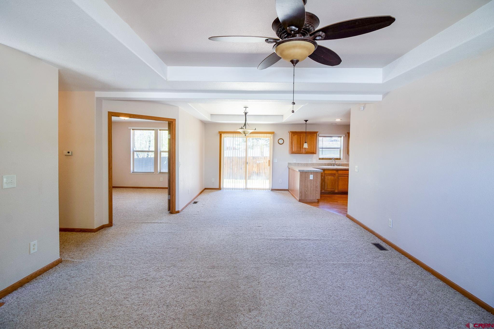 801 L Way Cortez, CO 81321 - Photo 10 of 41 a open kitchen with stove and white cabinets