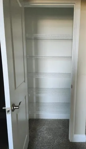 en empty room with windows