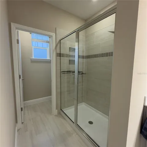 a view of a room with racks on the wall