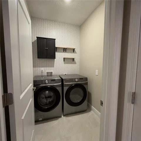 a view of a kitchen with a sink