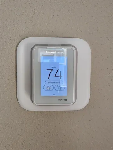 a close up of a wall with a painting on it