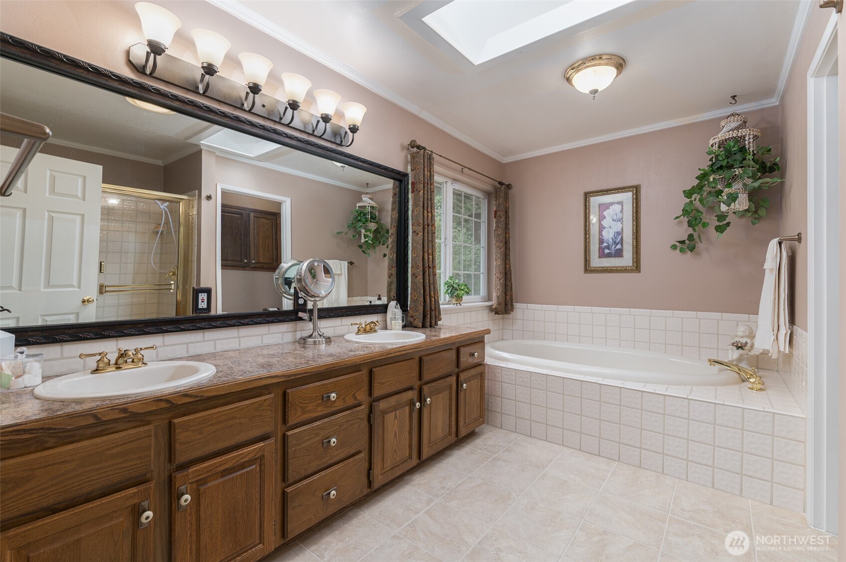 5860 Bell Creek Road Deming, WA 98244 - Photo 14 of 39 a spacious bathroom with a tub double sink and mirror