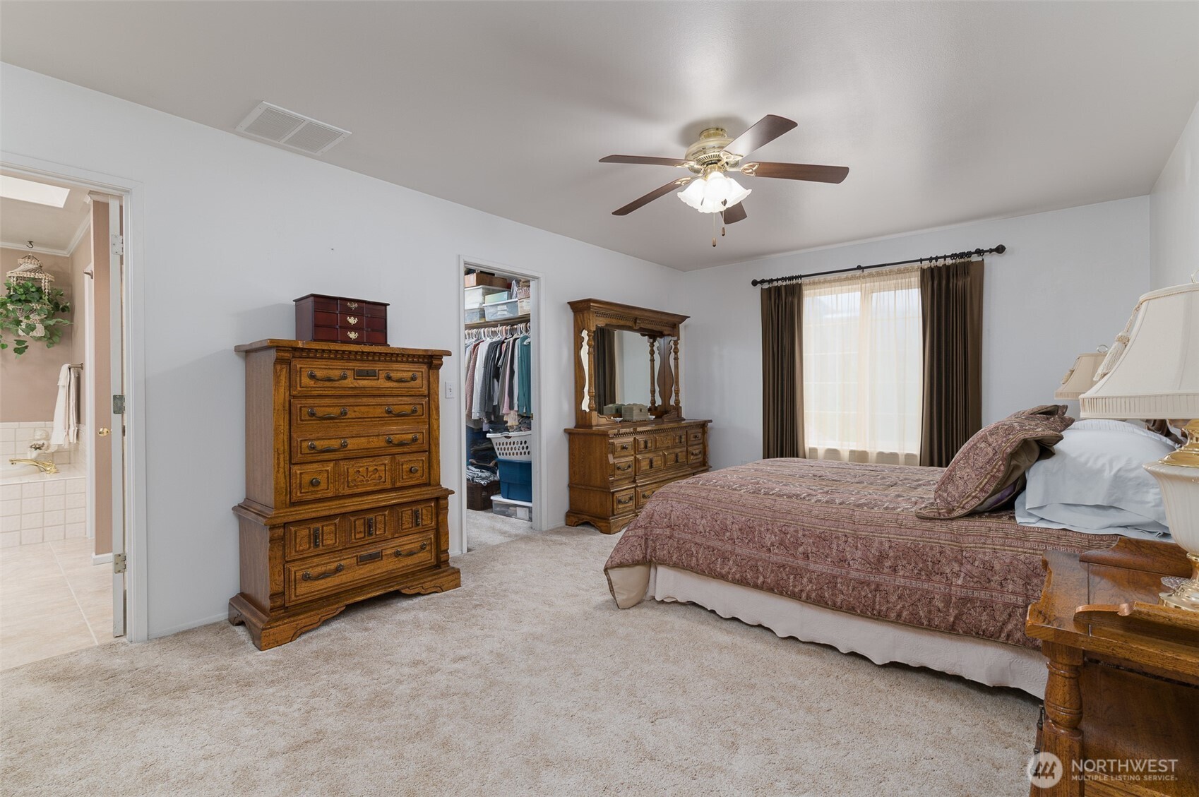 5860 Bell Creek Road Deming, WA 98244 - Photo 15 of 39 a bedroom with a bed and ceiling fan