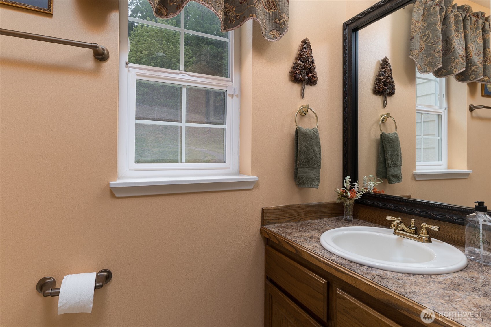 5860 Bell Creek Road Deming, WA 98244 - Photo 23 of 39 a bathroom with a granite countertop sink and a mirror