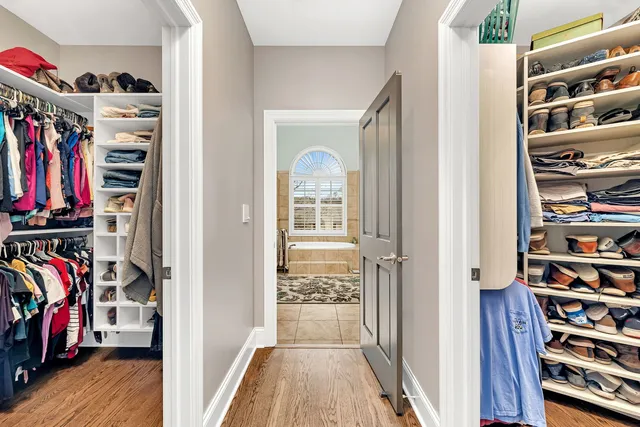 a spacious bathroom with a bathtub and a shower
