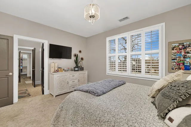 a bathroom with a sink vanity and a mirror