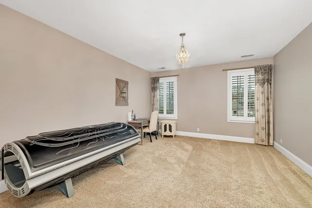 a view of a livingroom with furniture and a wooden floor
