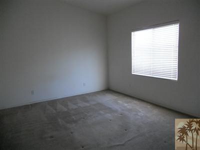 66120 Santa Rosa Road Desert Hot Springs, CA 92240 - Photo 5 of 9 an empty room with a window