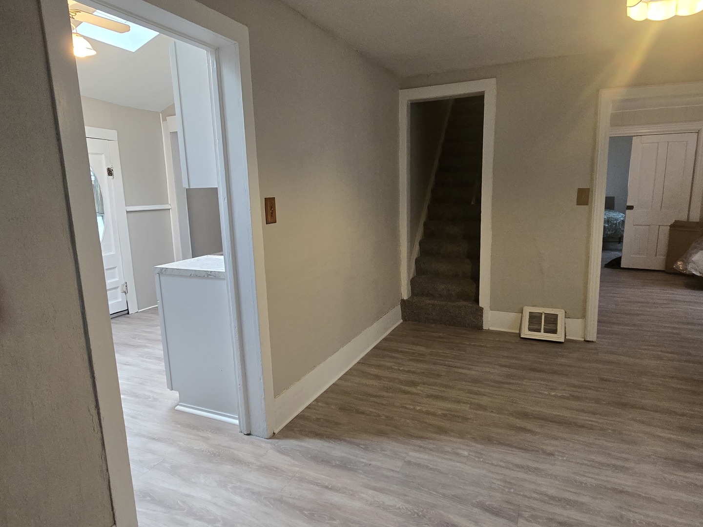 103 West Cherokee Avenue Shabbona, IL 60550 - Photo 30 of 42 a view of a hallway with wooden floor and a room