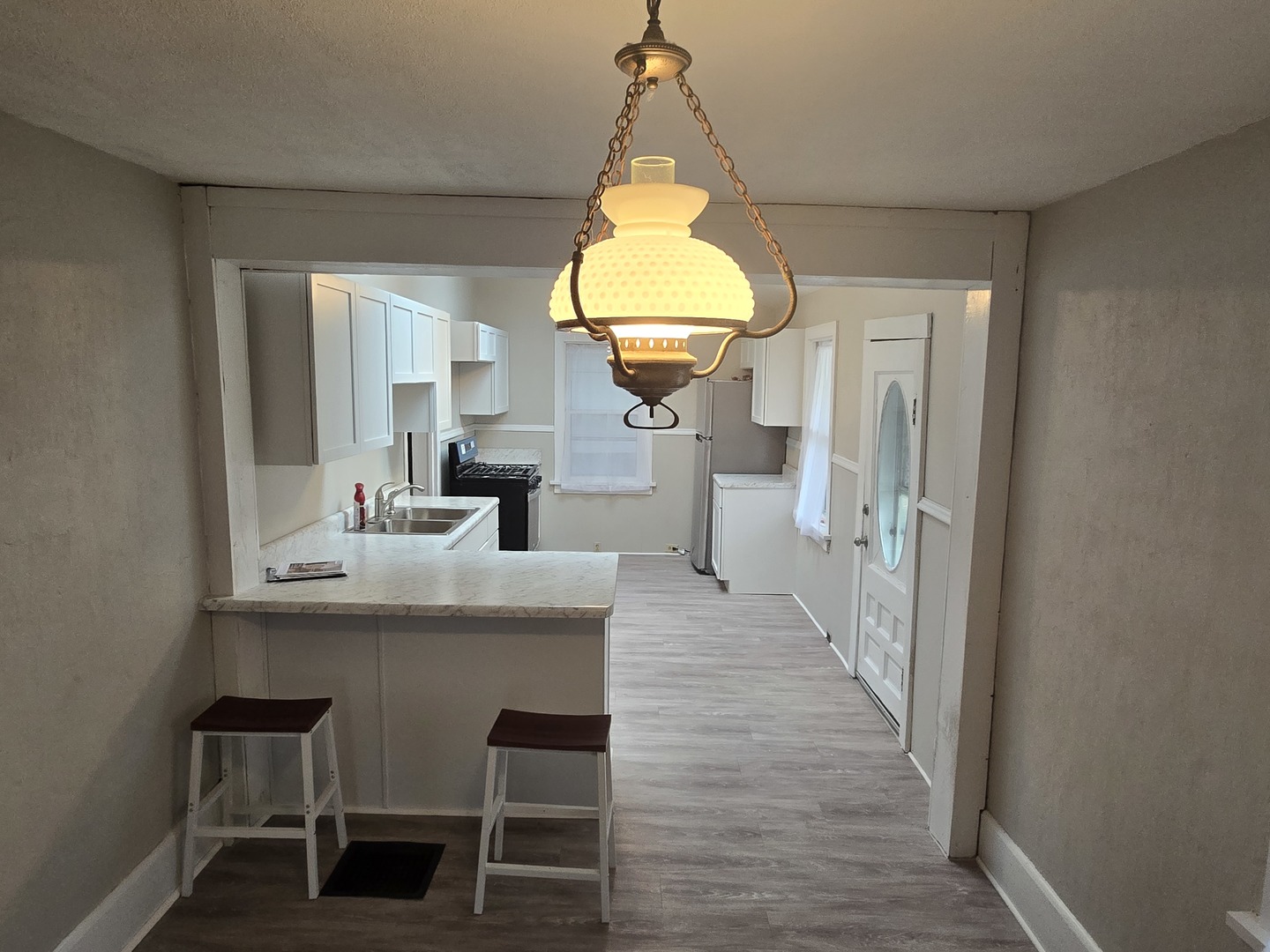 103 West Cherokee Avenue Shabbona, IL 60550 - Photo 36 of 42 a dining room with a table and chairs