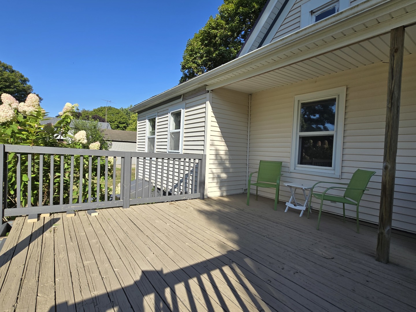 103 West Cherokee Avenue Shabbona, IL 60550 - Photo 38 of 42 a balcony with wooden floor