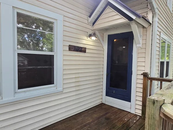 a view of front door and porch