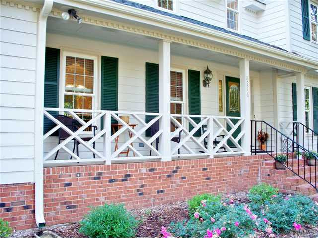 8516 Shadow Wood Place Raleigh, NC 27613 - Photo 2 of 25 Lots of room for rocking on this front porch! Porch