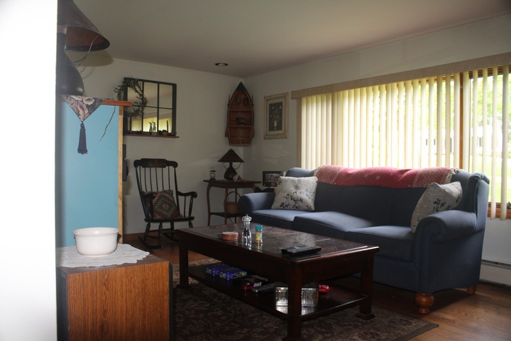 49 Quarry Road Granby, CT 06035 - Photo 16 of 25 a living room with furniture and a large window