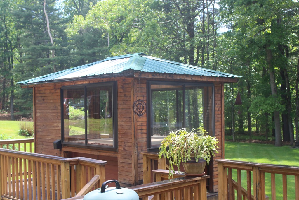 49 Quarry Road Granby, CT 06035 - Photo 7 of 25 a house view with a garden space