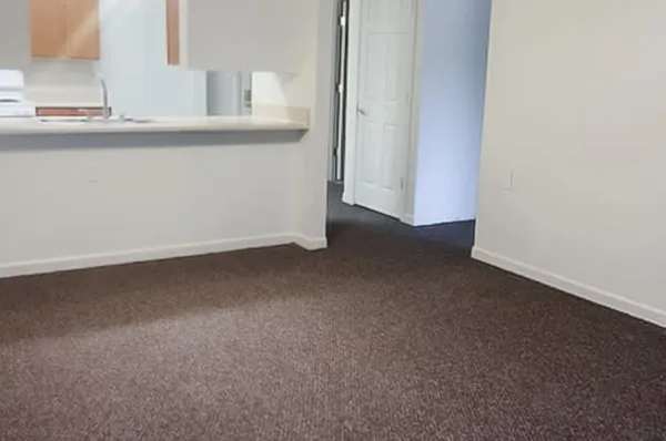 a view of a kitchen with a sink