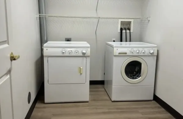 a utility room with dryer and washer