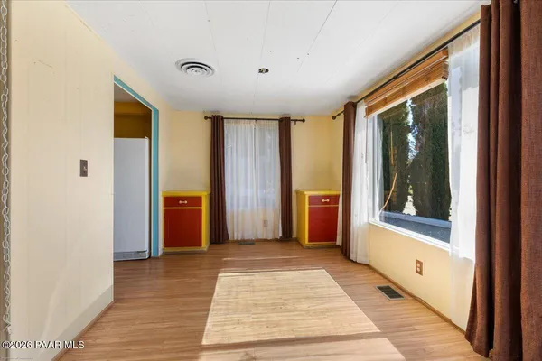 a view of a hallway with a bedroom