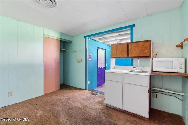 a room with storage and utility