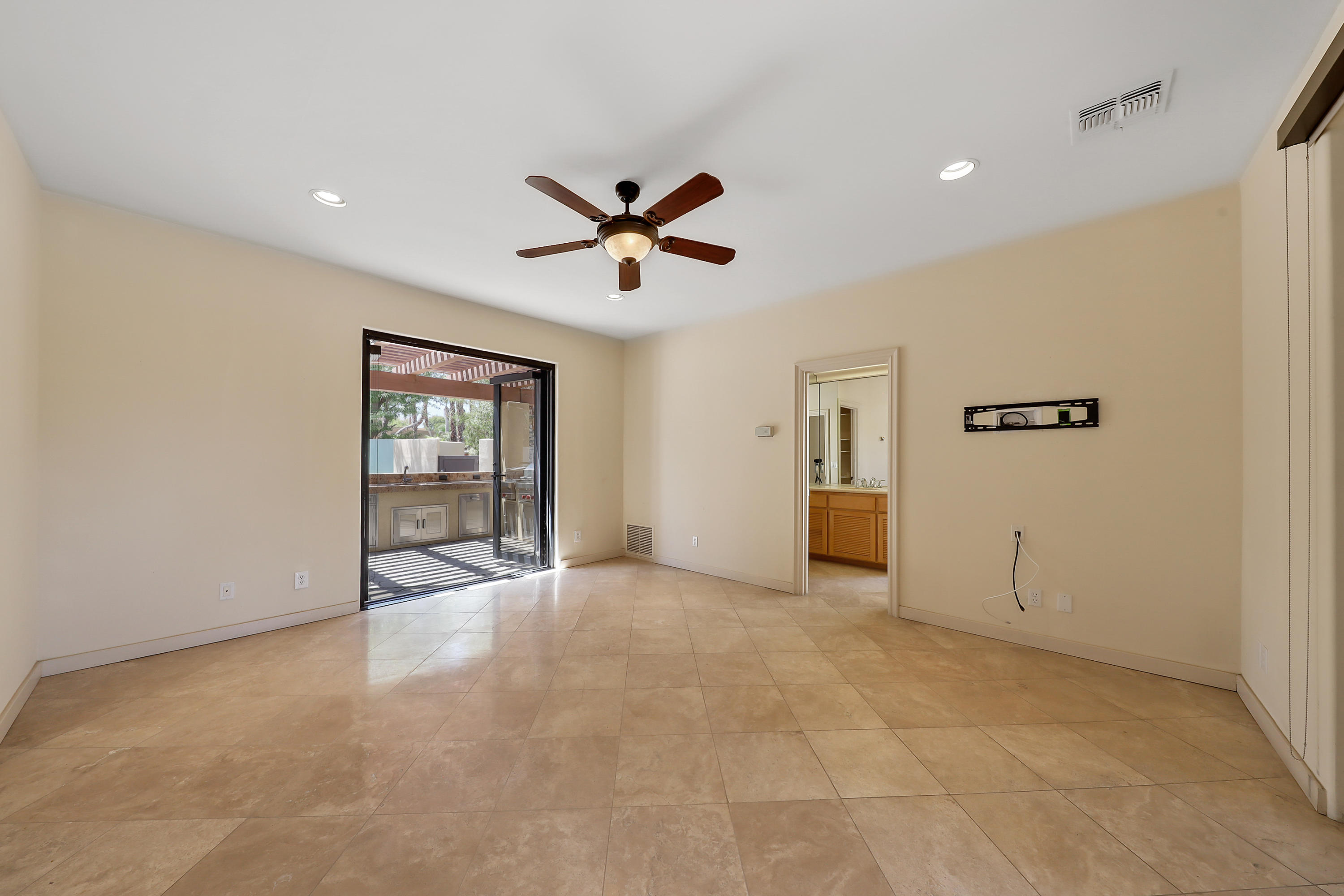 28 Clancy Lane South Rancho Mirage, CA 92270 - Photo 21 of 30 a view of a big room with closet and windows