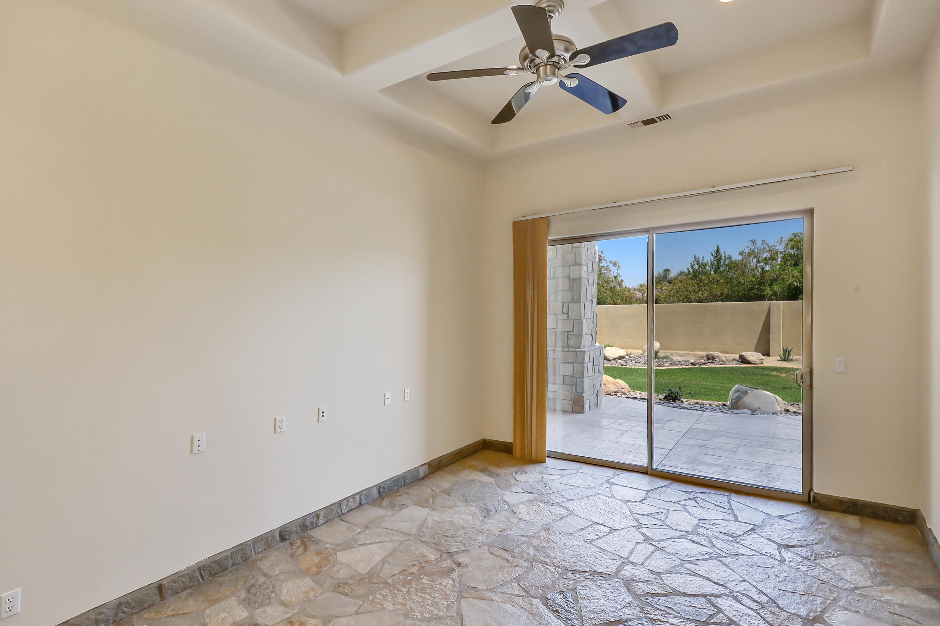 28 Clancy Lane South Rancho Mirage, CA 92270 - Photo 22 of 30 a view of room with window and ceiling fan