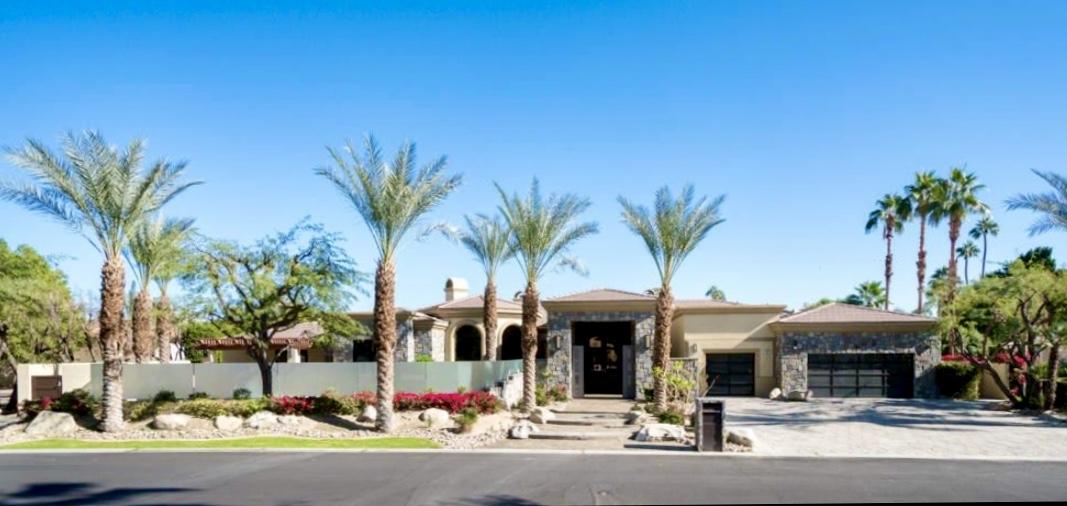 28 Clancy Lane South Rancho Mirage, CA 92270 - Photo 29 of 30 a view of a street with a building and palm trees