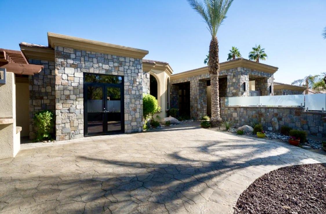 28 Clancy Lane South Rancho Mirage, CA 92270 - Photo 5 of 30 a view of a house with potted plants