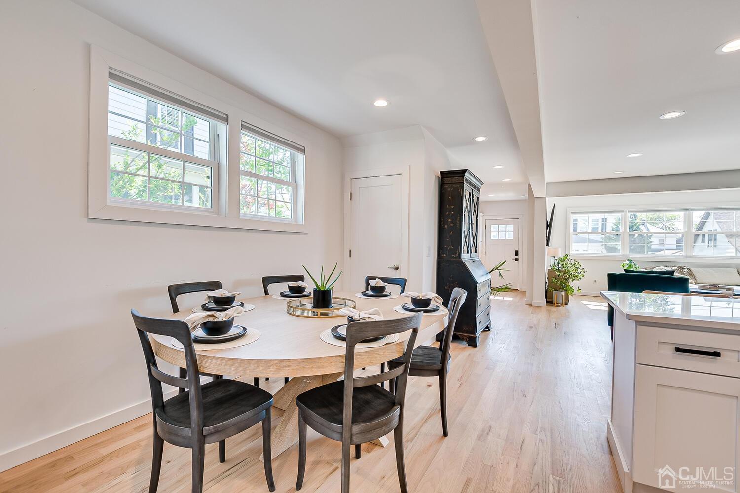 31 Carlton Street Edison, NJ 08837 - Photo 28 of 64 a view of a dining room with furniture and wooden floor