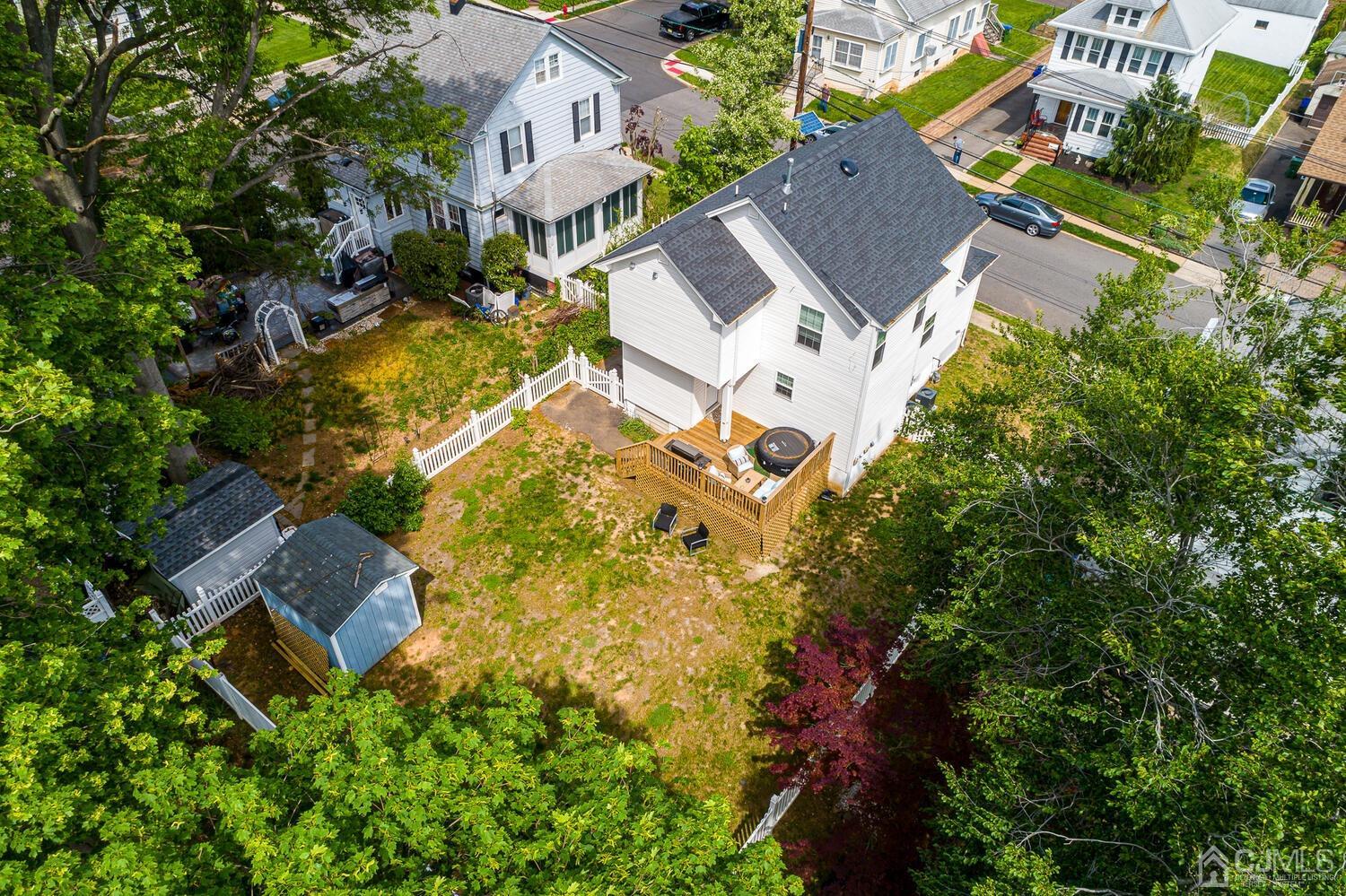 31 Carlton Street Edison, NJ 08837 - Photo 55 of 64 an aerial view of a house with a yard