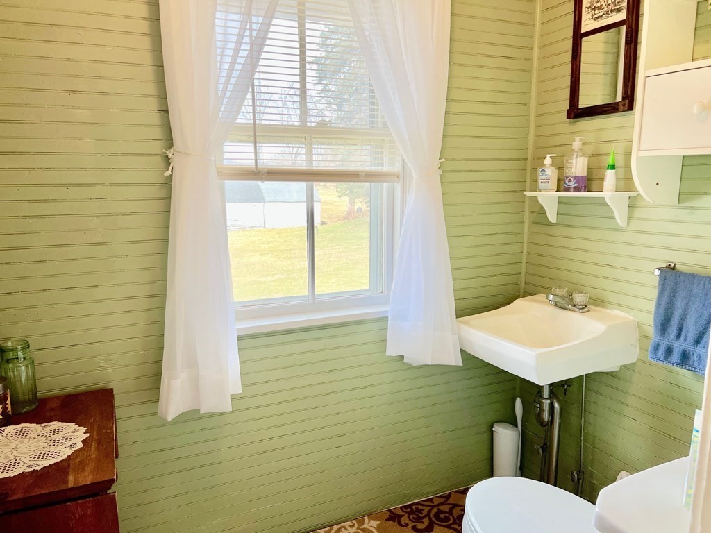 278 Birnam Road Northfield, MA 01360 - Photo 11 of 36 a bathroom with a sink a toilet and mirror