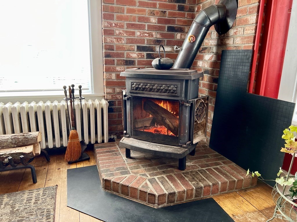 278 Birnam Road Northfield, MA 01360 - Photo 17 of 36 a living room with furniture and a fireplace