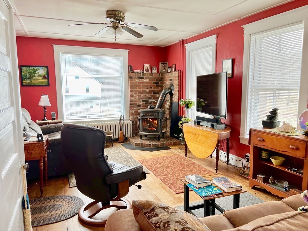 278 Birnam Road Northfield, MA 01360 - Photo 19 of 36 a living room with furniture a flat screen tv and wooden floor