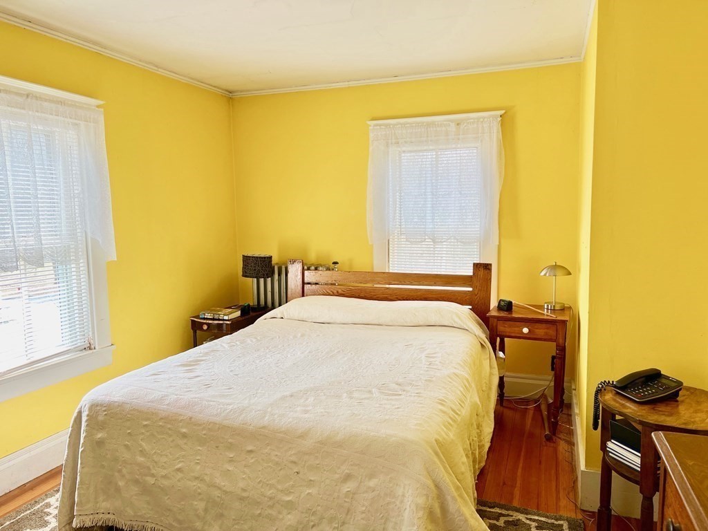278 Birnam Road Northfield, MA 01360 - Photo 22 of 36 a bed sitting in a bedroom next to a window