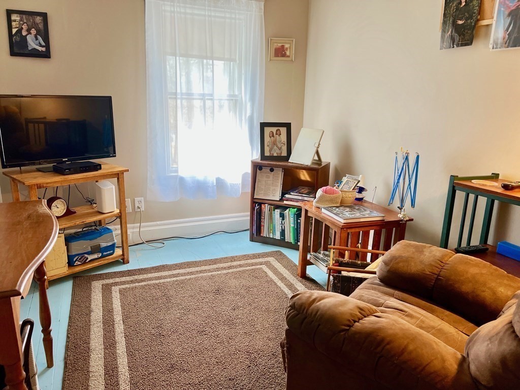 278 Birnam Road Northfield, MA 01360 - Photo 30 of 36 a living room with furniture and a flat screen tv