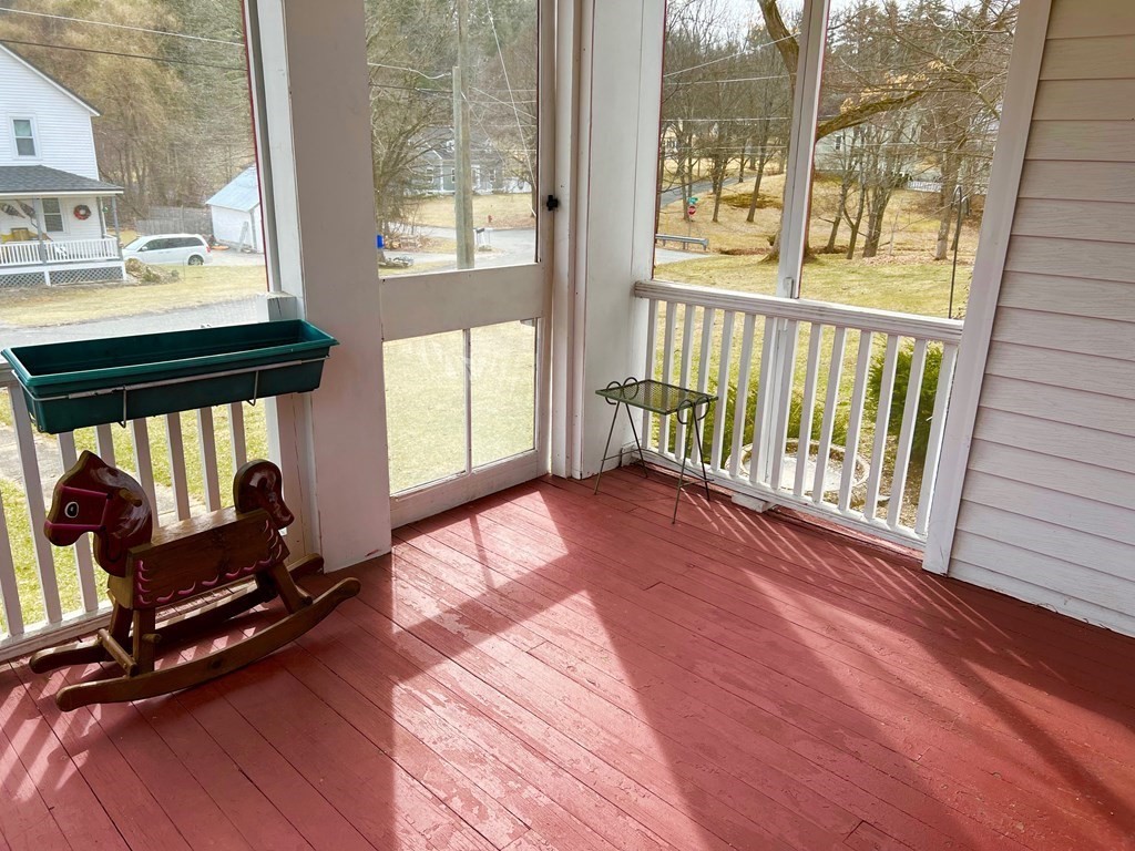 278 Birnam Road Northfield, MA 01360 - Photo 7 of 36 a view of an empty room with wooden floor and windows