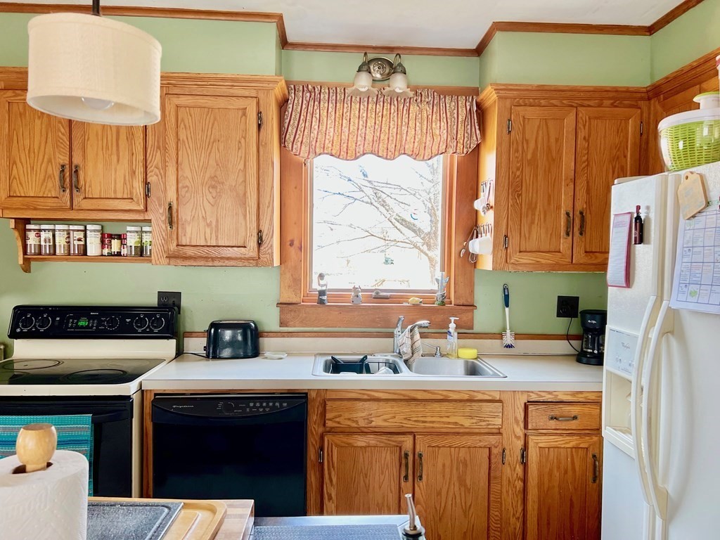 278 Birnam Road Northfield, MA 01360 - Photo 9 of 36 a kitchen with stainless steel appliances a stove a sink and a refrigerator