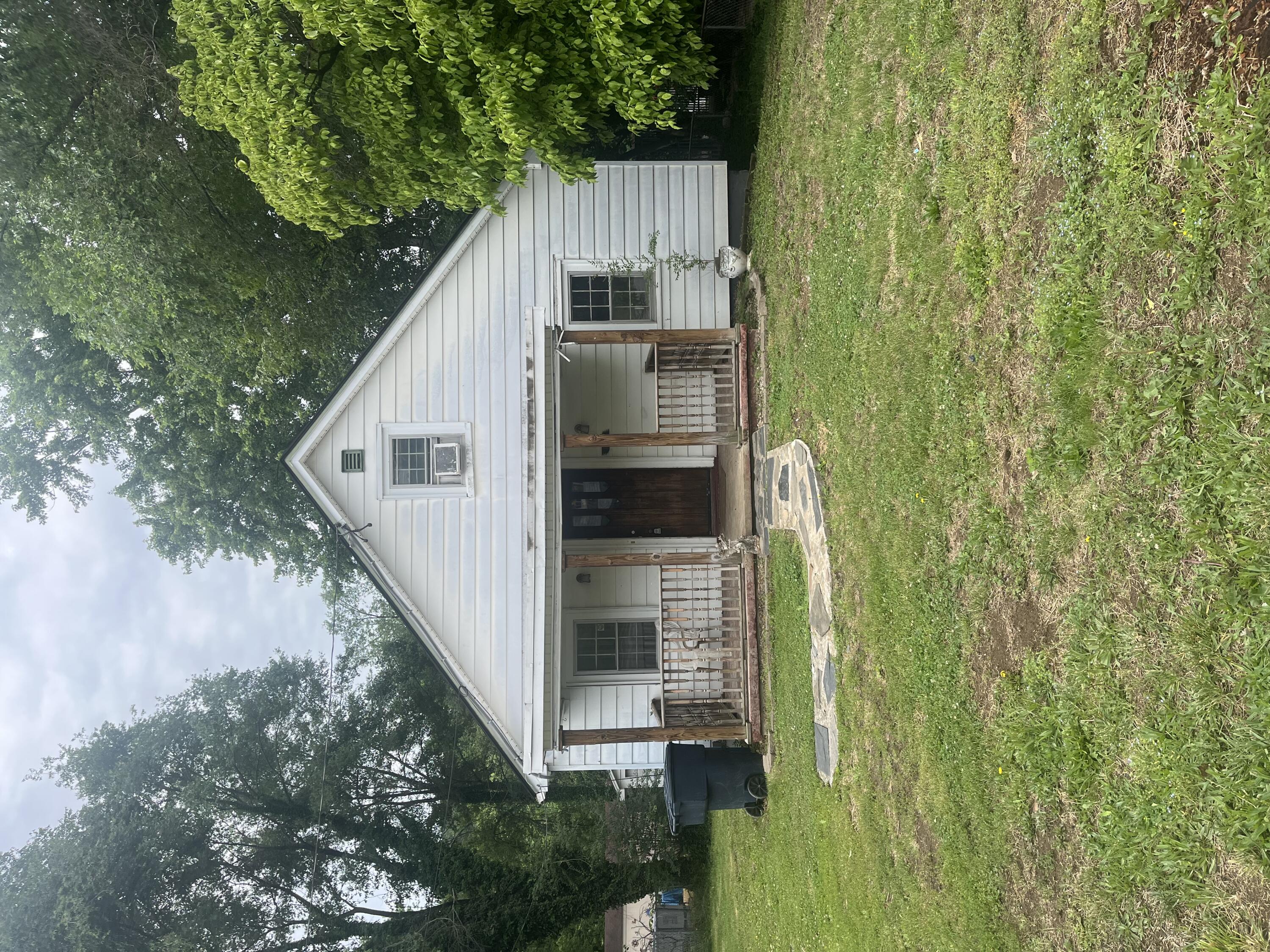 1815 Riverdale Road Southeast Roanoke, VA 24014 - Photo 1 of 10 a front view of house with yard and green space